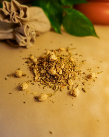 Saffron Serenity herbal tea blend with whole spices and a pouch