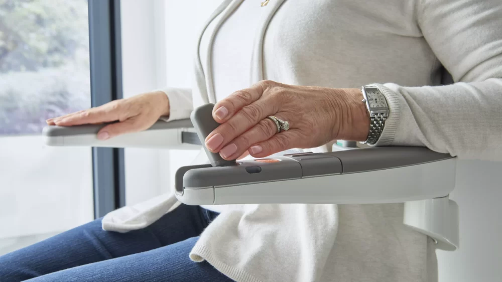 Fold-away soft-touch joystick mounted cleanly in armrest