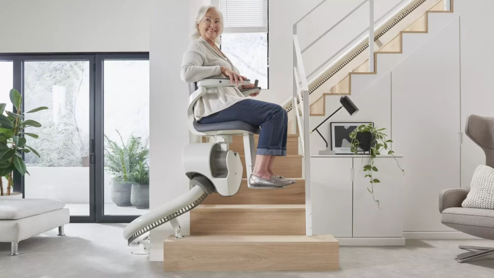 Access BDD Flow X curved indoor stairlift on single discrete rail