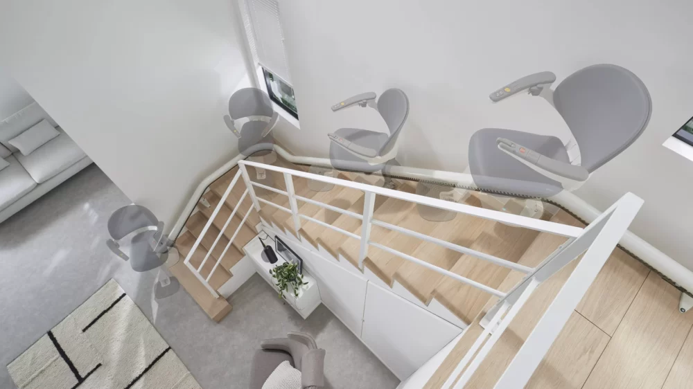 Access BDD Flow X curved indoor stairlift on single discrete rail