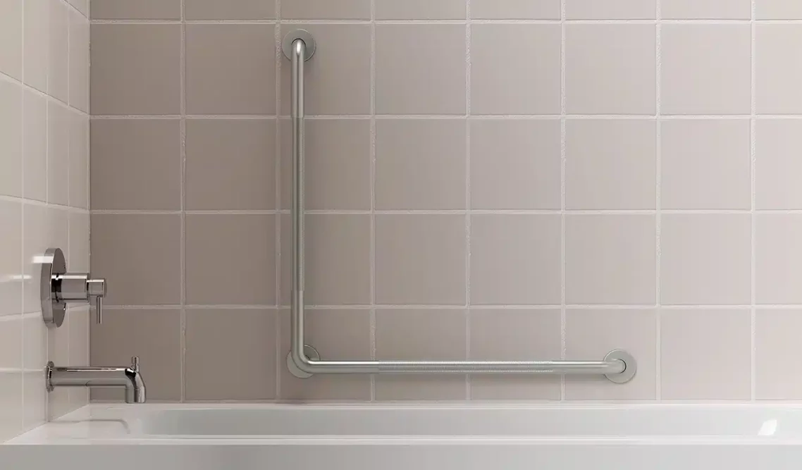 L-shaped grab bar detail showing concealed screw flanges and knurled texture