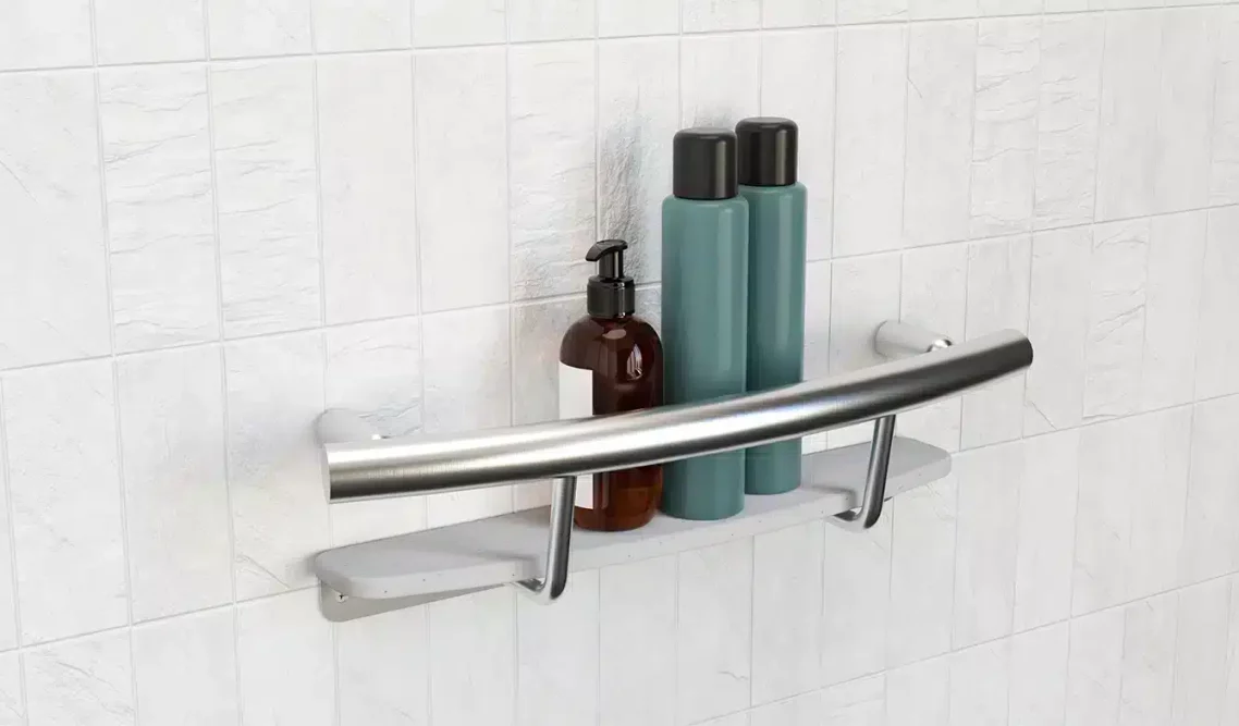 INVISIA shampoo shelf grab bar installed on shower wall with bath amenities