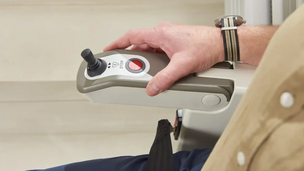 Ergonomic soft-touch joystick control on the armrest
