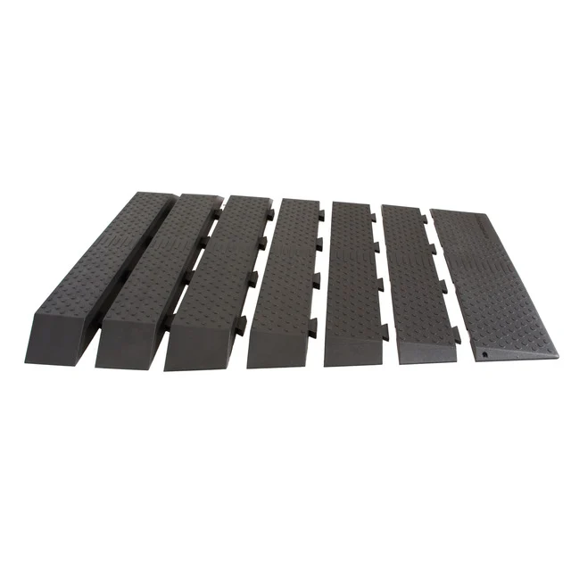 Black modular rubber threshold ramp sections with textured surface