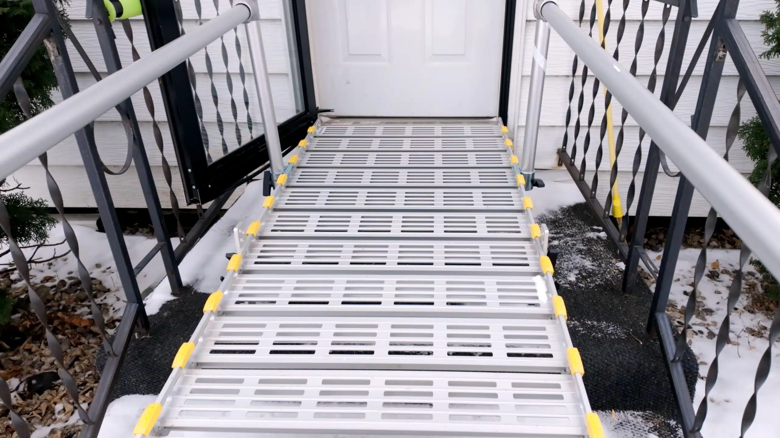 Roll-A-Ramp portable ramp at a house door
