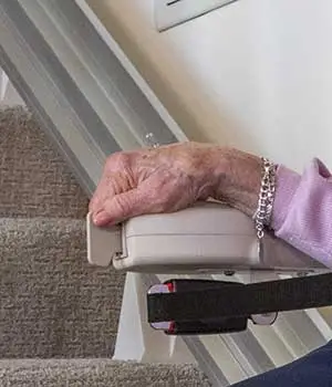 Armrest rocker control on the Elite straight indoor stairlift
