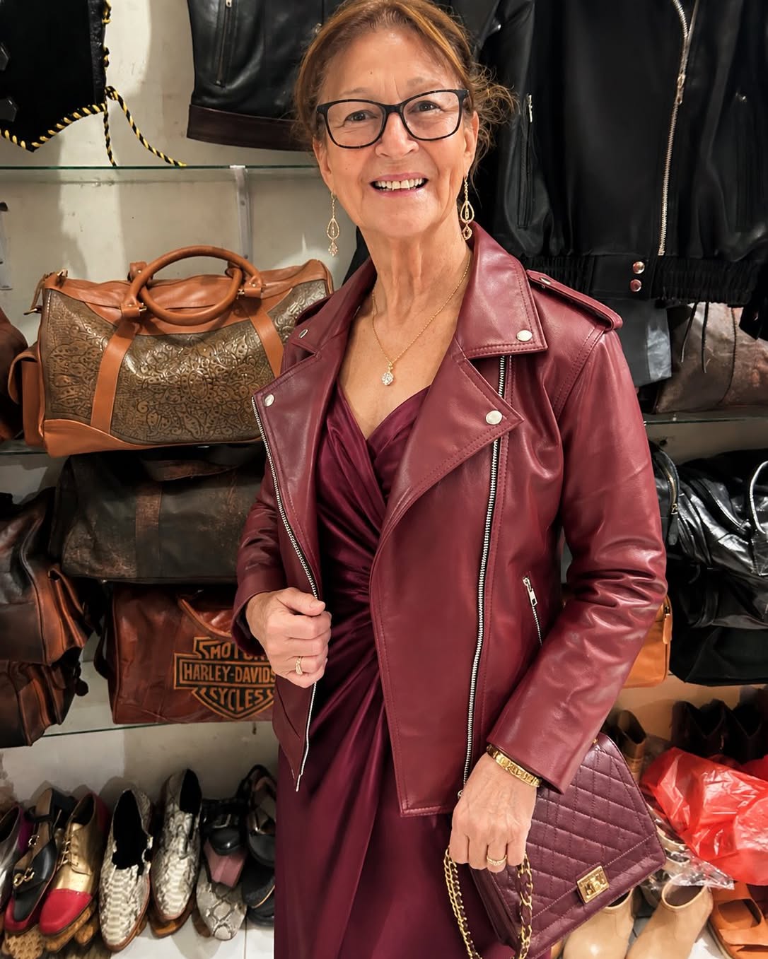 Custom tailored burgundy leather jacket and matching leather dress